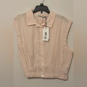 Calvin Klein cinched crop sleeveless blouse. Size medium. Color peach.